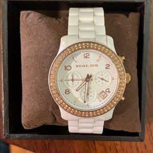 Michael Kors white and rose gold women’s watch